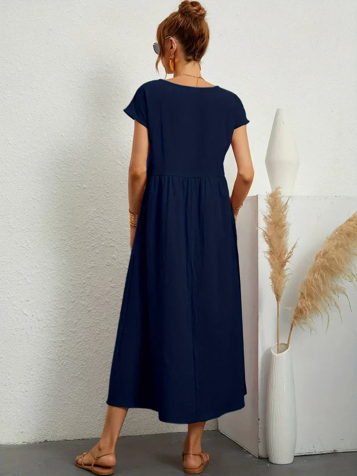 VESTIDO MEDIO FLUIDO ATEMPORAL
